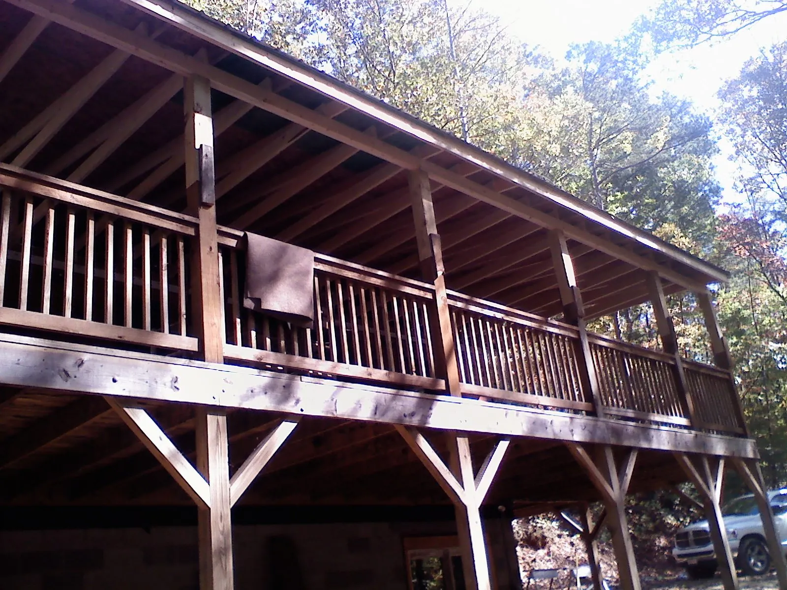 Timber framing under a new elevated porch and deck — Roof Leak Repair in Cooke City by Roofing Brothers